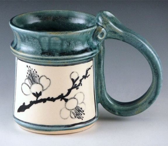 Ceramic plum blossom mug by Bonnie Belt